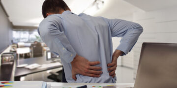 Desk Job Destroying Your Back? 5 Simple Fixes from Dr. Makda for Alexandria Office Workers